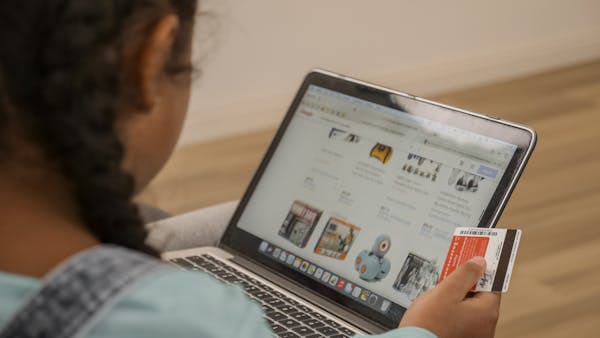 girl exploring ecommerce website