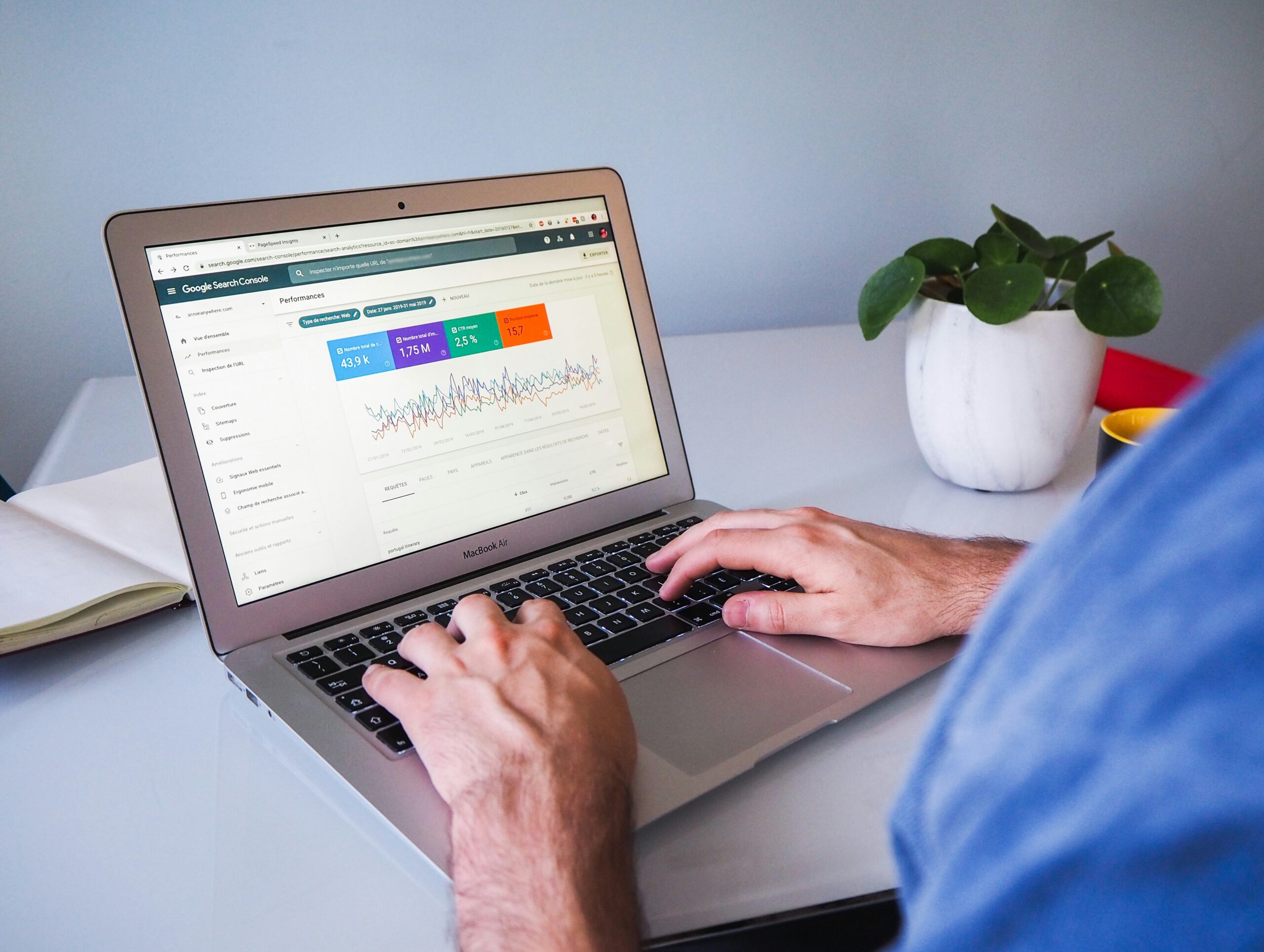 A person analyzing backlink metrics and SEO performance on Google Search Console, highlighting how link building tools enhance visibility and rankings.