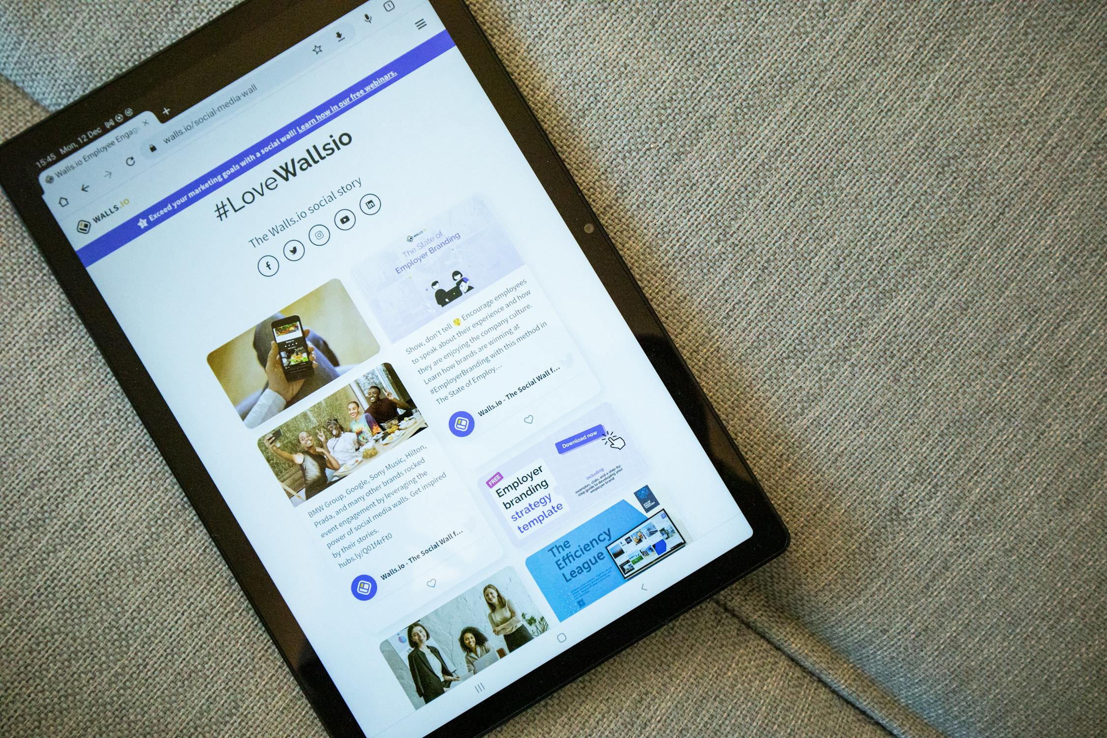 free photo of tablet displaying front page of walls io websitejpeg | Day by Day Digital blogs website with engaging content