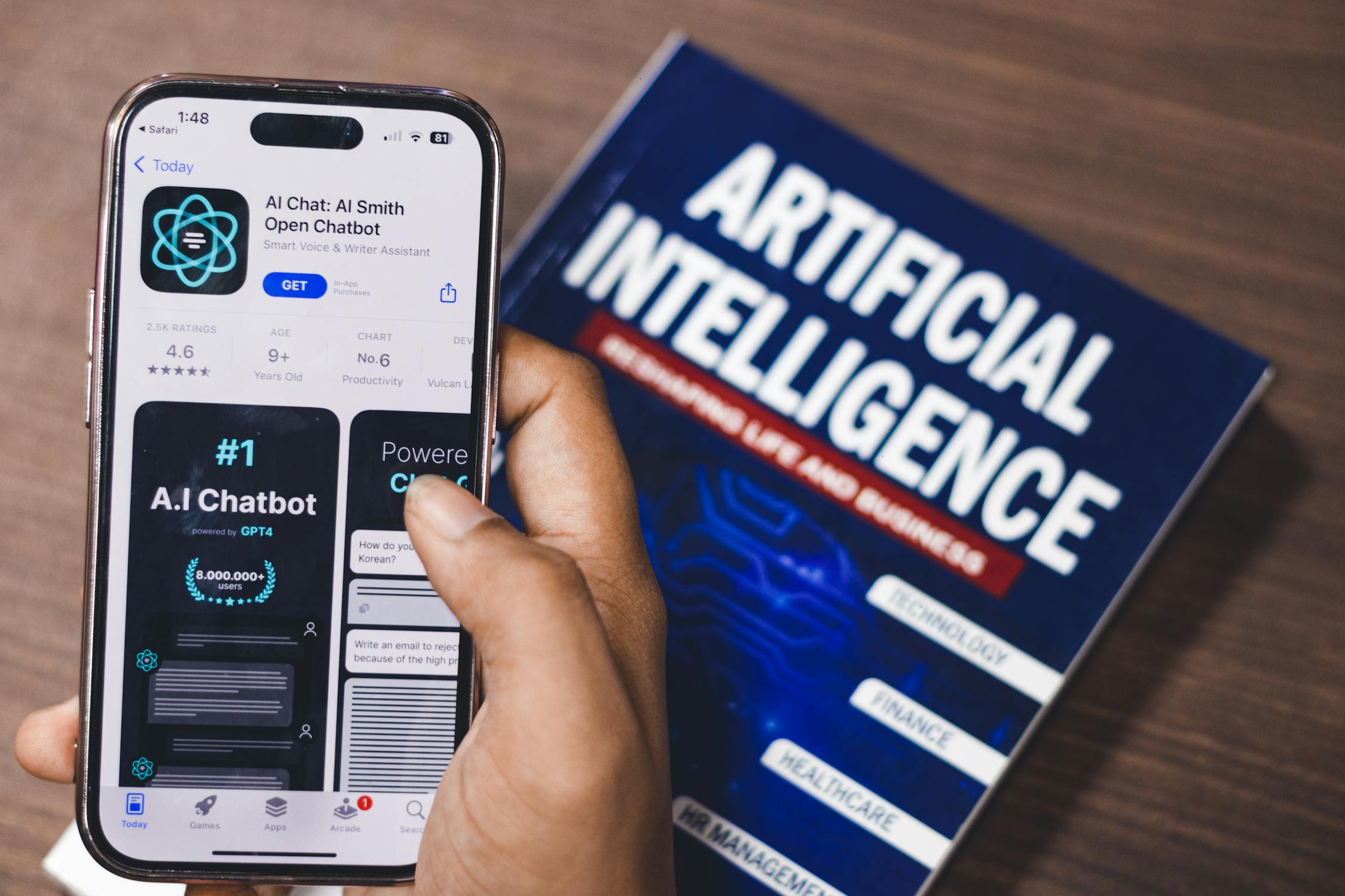 free photo of webpage of ai chatbot a prototype ai smith open chatbot is seen on the website of openai on a apple smartphone examples capabilities and limitations are shownjpeg | Day by Day Digital artificial intelligence application and booklet