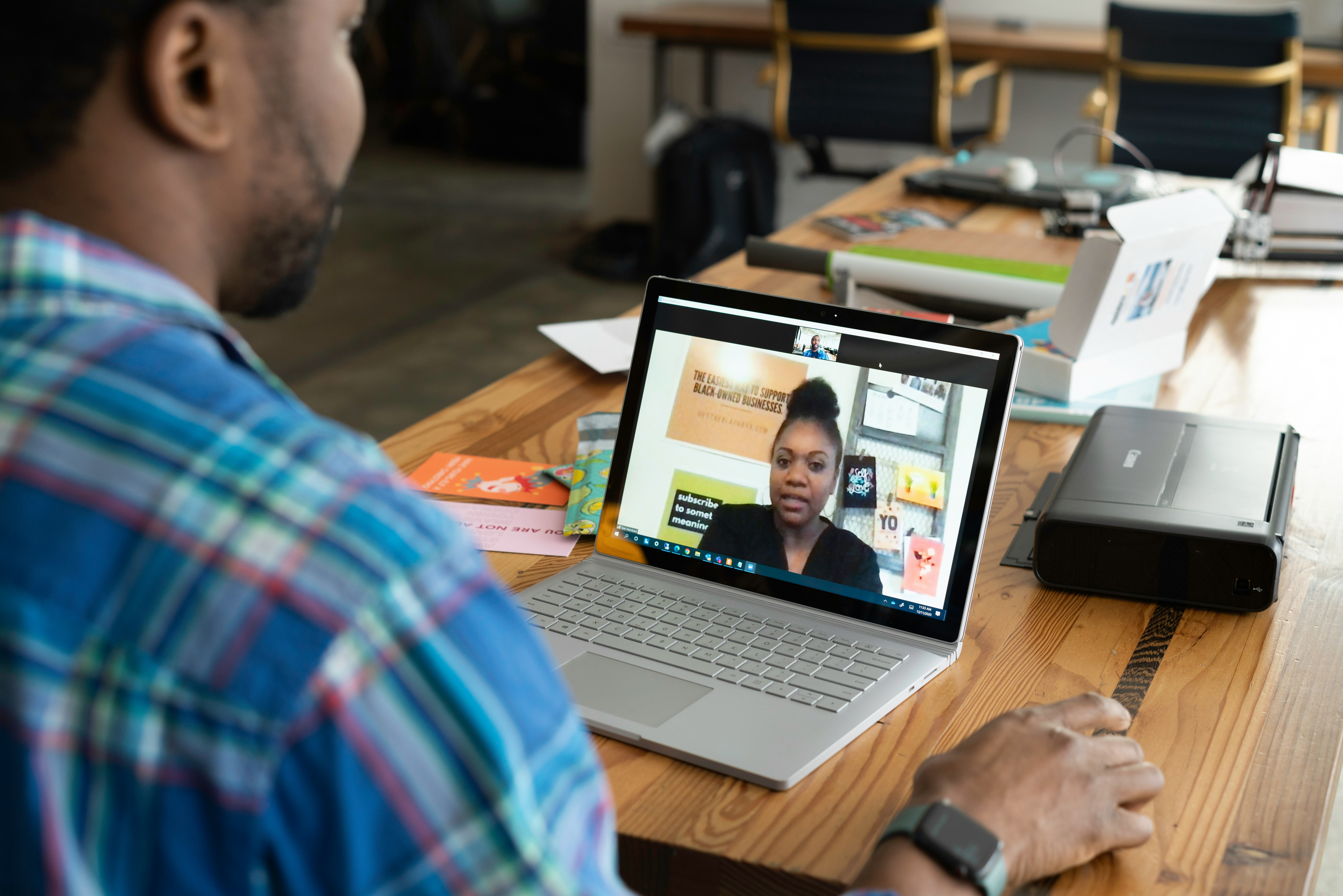 A man participates in a virtual meeting with a local SEO expert, discussing service pricing options and comparing value for strategic investment. | Day by Day Digital A man participates in a virtual meeting with a local SEO expert, discussing service pricing options and comparing value for strategic investment.