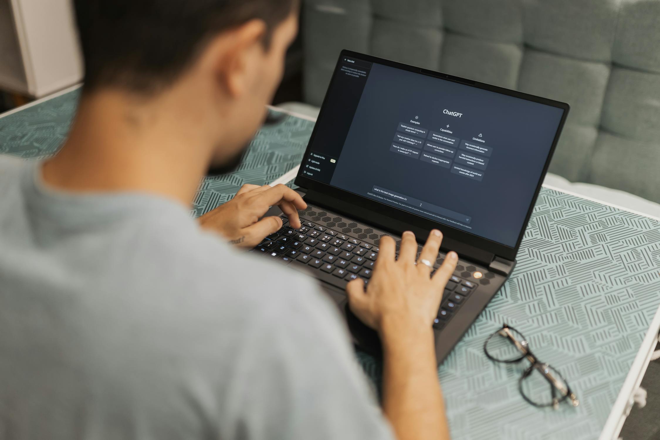 free photo of man using laptop wit chat gptjpeg | Day by Day Digital man using chatgpt