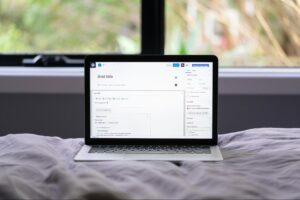 A laptop screen displaying a WordPress editor highlights the process of creating optimized SEO content tailored to drive the best organic results.