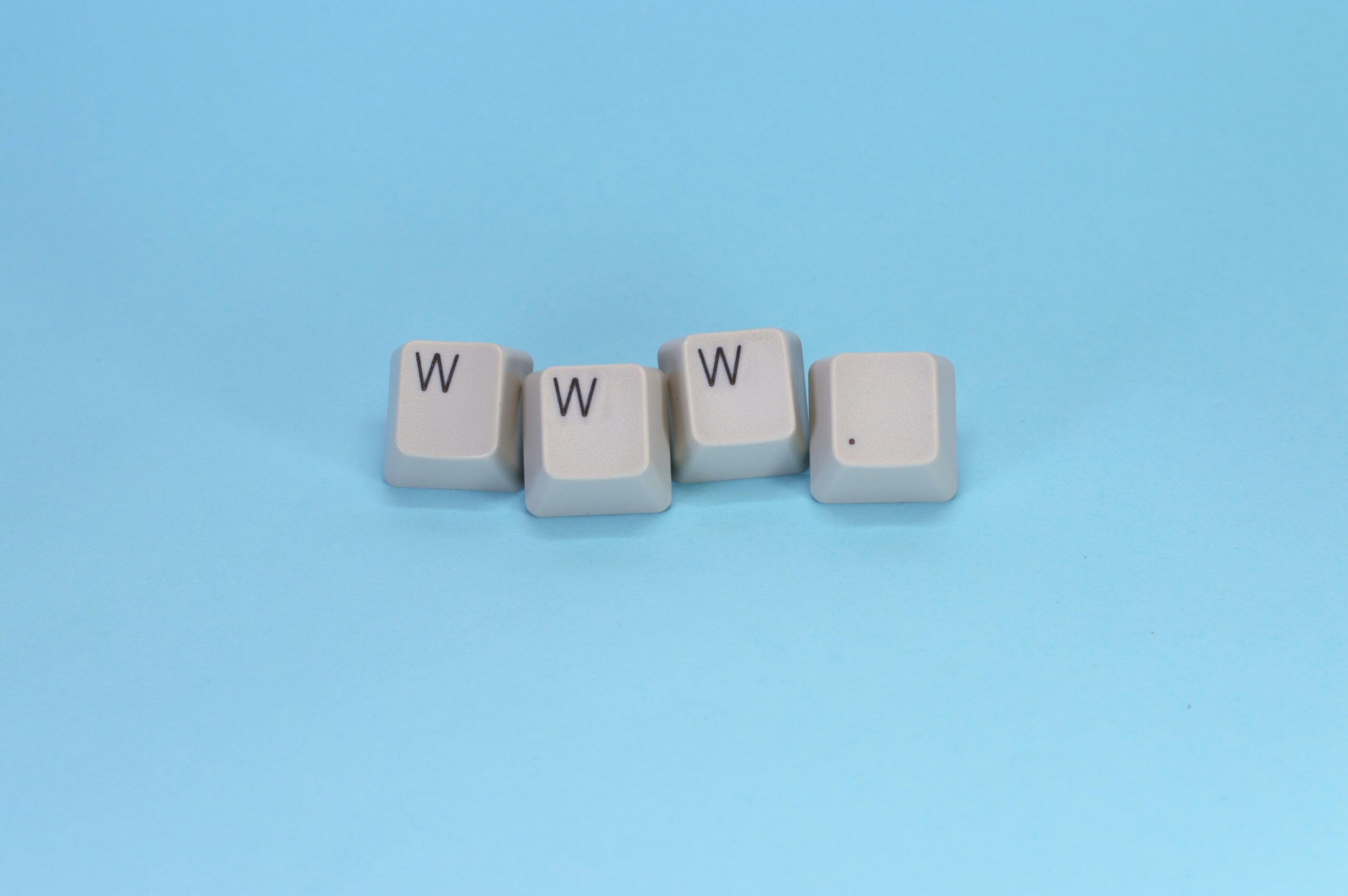 Four keyboard keys spelling “WWW.” on a blue background, symbolizing how website performance metrics like Core Web Vitals impact SEO content marketing. | Day by Day Digital Four keyboard keys spelling “WWW.” on a blue background, symbolizing how website performance metrics like Core Web Vitals impact SEO content marketing.